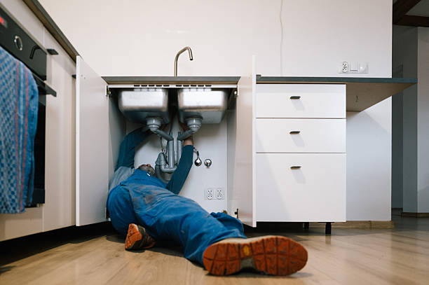 Professional Emergency Plumber technician working in Burton, WV